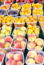 Baskets of peaches and plums Royalty Free Stock Photo