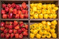 Baskets with sweet red and yellow peppers in the mall