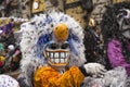 Basel carnival 2016. A waggis throwing confetti