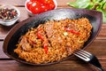 Basmati rice with meat, vegetables and aromatic spices on wooden table Royalty Free Stock Photo