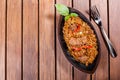 Basmati rice with meat, vegetables and aromatic spices on wooden table Royalty Free Stock Photo