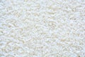 Basmati white rice solid texture. Top view close-up on raw rice grains Royalty Free Stock Photo