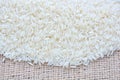 Basmati white rice solid texture. Top view close-up on raw rice grains Royalty Free Stock Photo