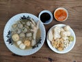 Baso Aci, a soupy food consisting of meatballs, various crackers, chicken claws.