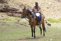 Basotho on his horse, coming back from shopping.