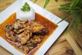 Basquaise Basque style chicken and vegetable stew meal on wooden table