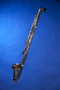 Bass Clarinet Isolated on Blue Royalty Free Stock Photo