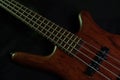 Bass guitar with brown body Royalty Free Stock Photo