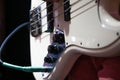 Bass guitar close up. Musical creativity concept.