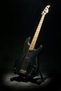 Bass guitar in dark Royalty Free Stock Photo