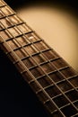 Bass guitar fretboard and strings Royalty Free Stock Photo