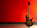 Bass Guitar on a red background Royalty Free Stock Photo