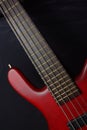 Bass guitar with red body