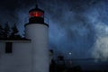 Bass harbor head lighthouse on a foggy night in Bass Harbor Maine Royalty Free Stock Photo