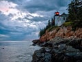 Bass Harbor Lighthouse and stormclouds at dusk Royalty Free Stock Photo