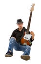 Bassist playing on white background Royalty Free Stock Photo