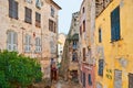 The alley between shabby residential houses in Bastia,  France Royalty Free Stock Photo