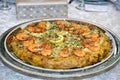 Bastila or `Pastilla` is a traditional moroccan dish. fish Bastila is a pie filled with fish`s , eggs,onions, sugar. In some Royalty Free Stock Photo