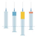 Set of four differently filled syringes Royalty Free Stock Photo