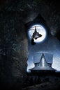 Bat with moon and haunted house Royalty Free Stock Photo