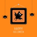 Bat in picture frame on nail. Hanging spiders. Happy Halloween card. Orange background Flat design Royalty Free Stock Photo