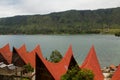 Batak-style houses with red roofs, Lake Toba, Indonesia.