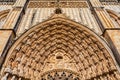 Batalha, Portugal. Close-up of the tympanum, archivolts and lintel of the Portal of Batalha Abbey aka Monastery of Santa Maria da