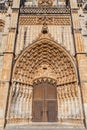 Batalha, Portugal. Portal of Batalha Abbey aka Monastery of Santa Maria da Vitoria, with tympanum, archivolts and lintel and other Royalty Free Stock Photo