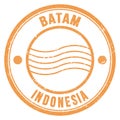 BATAM - INDONESIA, words written on brown postal stamp