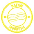 BATAM - INDONESIA, words written on yellow postal stamp