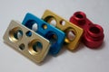 batch of anodize aluminum cnc parts production. close-up. Royalty Free Stock Photo