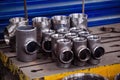 Batch of T shape pipe parts in factory