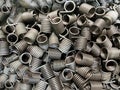 Batch of torsion springs viewed from above, spring texture, mass production