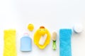 Bath accessories for kids. Yellow rubber duck, soap, sponge, brushes, towel on white background top view copyspace Royalty Free Stock Photo