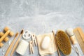 Bath accessories and natural SPA cosmetic products on stone background. Flat lay, top view. Personal hygiene and body treatment Royalty Free Stock Photo