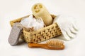 Bath accessory, various spa and beauty threatment products, body scrub in wooden basket.