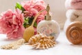 Bath arrangement with parfume bottle and pretty flowers Royalty Free Stock Photo