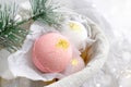Bath balls in basket with fir branch. Spa aromatherapy concept.