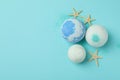 Bath balls and starfishes on blue background Royalty Free Stock Photo