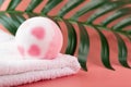 Bath bomb on a towel, shower salt ball, copy space Royalty Free Stock Photo