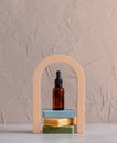 bath bottle and soap on arch decorated background Royalty Free Stock Photo