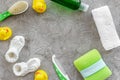 Bath cosmetic set for kids, towel and toys on gray background top view space for text Royalty Free Stock Photo