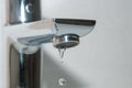 Bath faucet and falling water drops Royalty Free Stock Photo