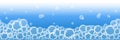 Bath foam on blue background. Shampoo and soap bubbles texture border. Vector illustration Royalty Free Stock Photo