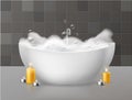 Bath with foam. Relaxing bath with soap bubbles foaming, bubbly bathtub in luxurious bathroom and burning candles Royalty Free Stock Photo