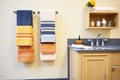 bath and hand towels in a color-coordinated display