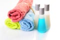 Bath products and soft multicolour towels Royalty Free Stock Photo