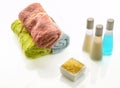 Bath products and soft multicolour towels Royalty Free Stock Photo