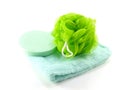 Bath puff and sponge with towel on white background Royalty Free Stock Photo