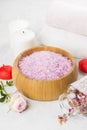 Bath salt with aroma of a rose in a wooden bowl, petals and a fr Royalty Free Stock Photo